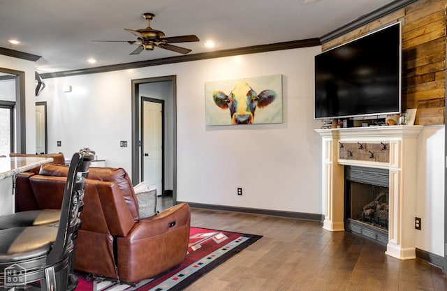 109 Harper Dr, Brookland, AR 72417 - living area with crown molding, dark wood-style floors, a ceiling fan, baseboards, and recessed lighting