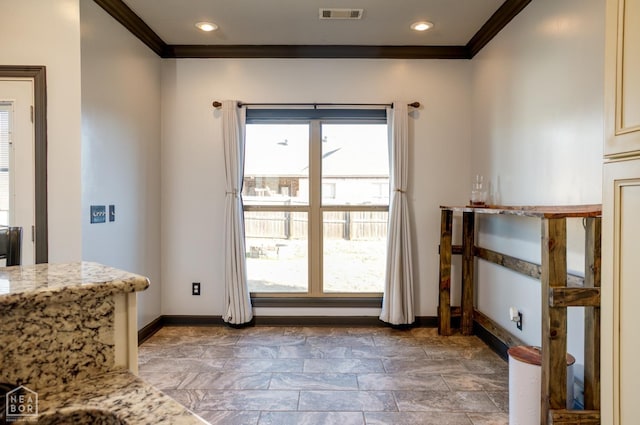 109 Harper Dr, Brookland, AR 72417 - dining space with crown molding and baseboards