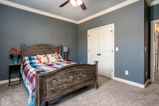 109 Harper Dr, Brookland, AR 72417 - bedroom with ornamental molding, carpet, baseboards, and a closet