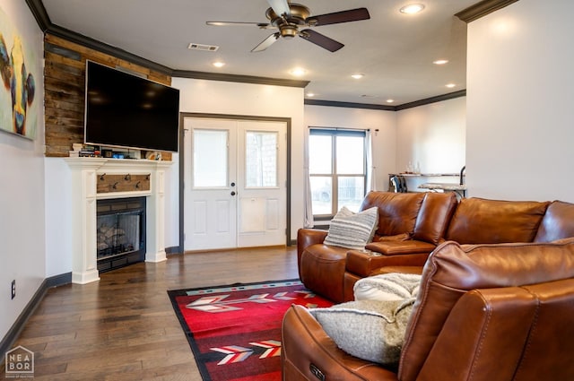 109 Harper Dr, Brookland, AR 72417 - living area with ceiling fan, crown molding, wood finished floors, a fireplace, and recessed lighting