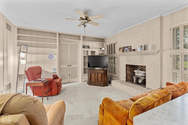 815 NW 3rd St, Walnut Ridge, AR 72476 - carpeted living area featuring built in features, ceiling fan, ornamental molding, and visible vents