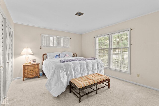 815 NW 3rd St, Walnut Ridge, AR 72476 - bedroom with light carpet, baseboards, and ornamental molding