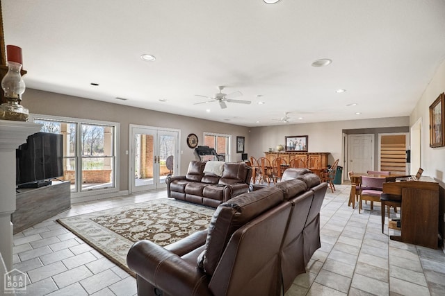 living room featuring light tile patterned floors, a ceiling fan, and recessed lighting