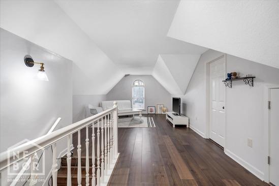 4024 Chapel Hill Dr, Jonesboro, AR 72404 - additional living space with hardwood / wood-style flooring and lofted ceiling