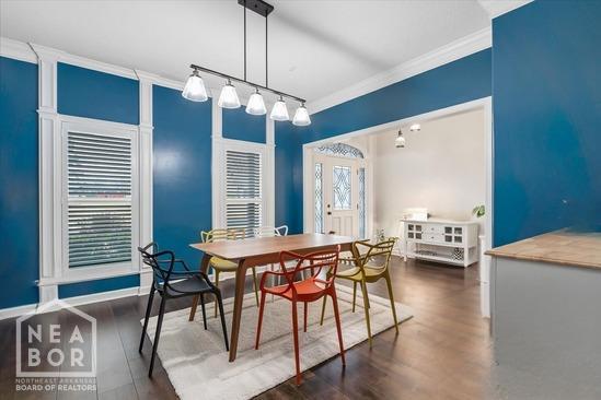 4024 Chapel Hill Dr, Jonesboro, AR 72404 - dining space featuring ornamental molding and wood finished floors