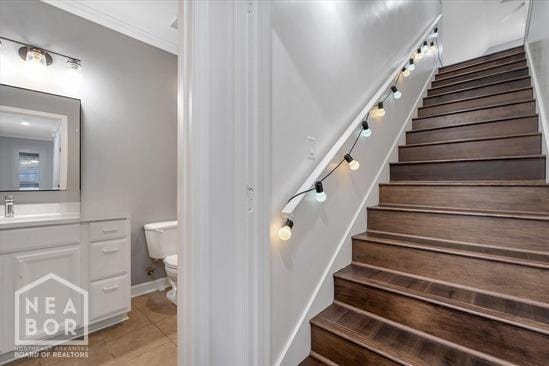 4024 Chapel Hill Dr, Jonesboro, AR 72404 - staircase featuring tile patterned floors, baseboards, and ornamental molding