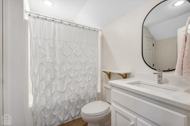 4024 Chapel Hill Dr, Jonesboro, AR 72404 - full bath featuring vaulted ceiling, vanity, shower / bath combo, toilet, and recessed lighting