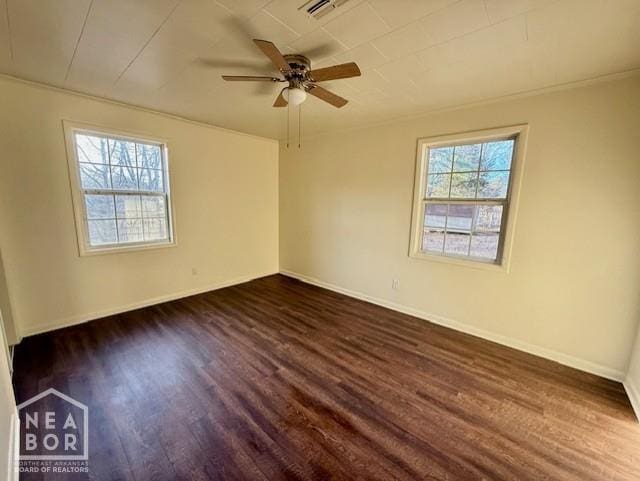 2187 Seagraves Rd, Pocahontas, AR 72455 - empty room with dark wood finished floors and a ceiling fan