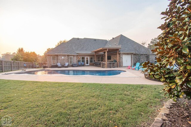 3600 Annadale Dr, Jonesboro, AR 72404 - pool at dusk featuring a patio area