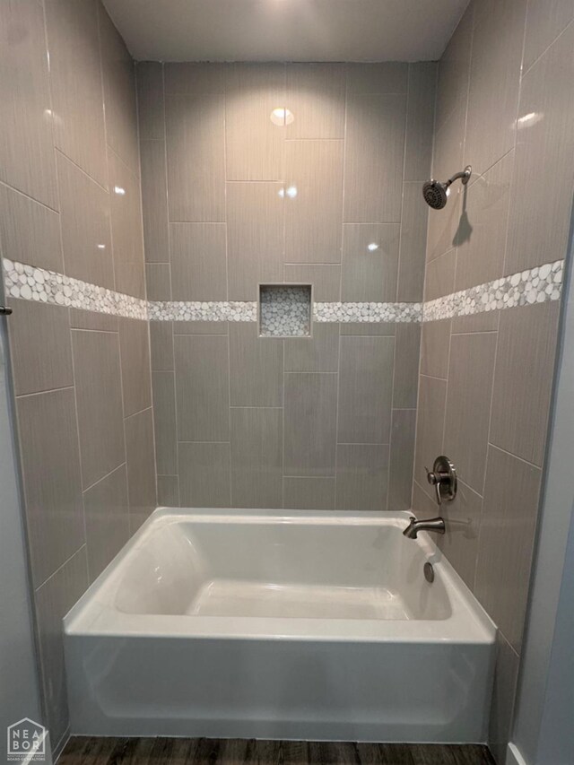 210 E College St, Bono, AR 72416 - full bath with wood finished floors and shower / bath combination