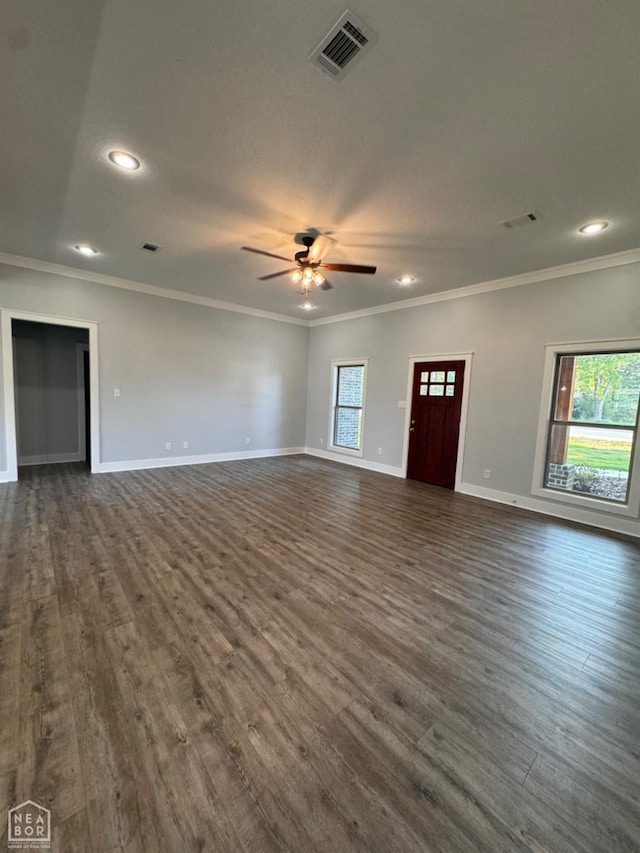 210 E College St, Bono, AR 72416 - unfurnished living room with crown molding, dark wood finished floors, baseboards, a ceiling fan, and recessed lighting