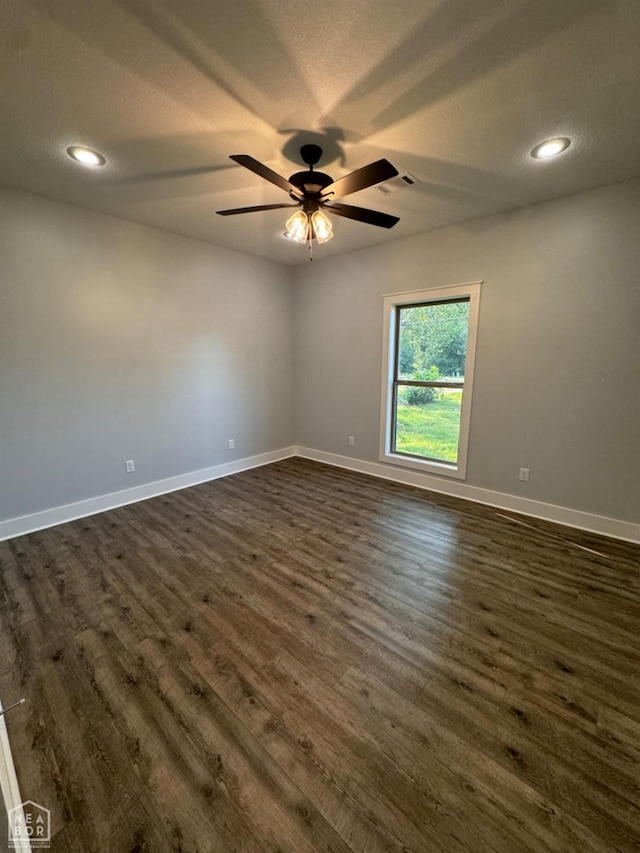 210 E College St, Bono, AR 72416 - unfurnished room featuring dark wood finished floors, baseboards, ceiling fan, and recessed lighting