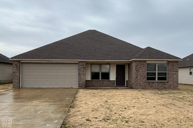 3813 Remington Dr, Jonesboro, AR 72404 - single story home with concrete driveway, a shingled roof, and brick siding
