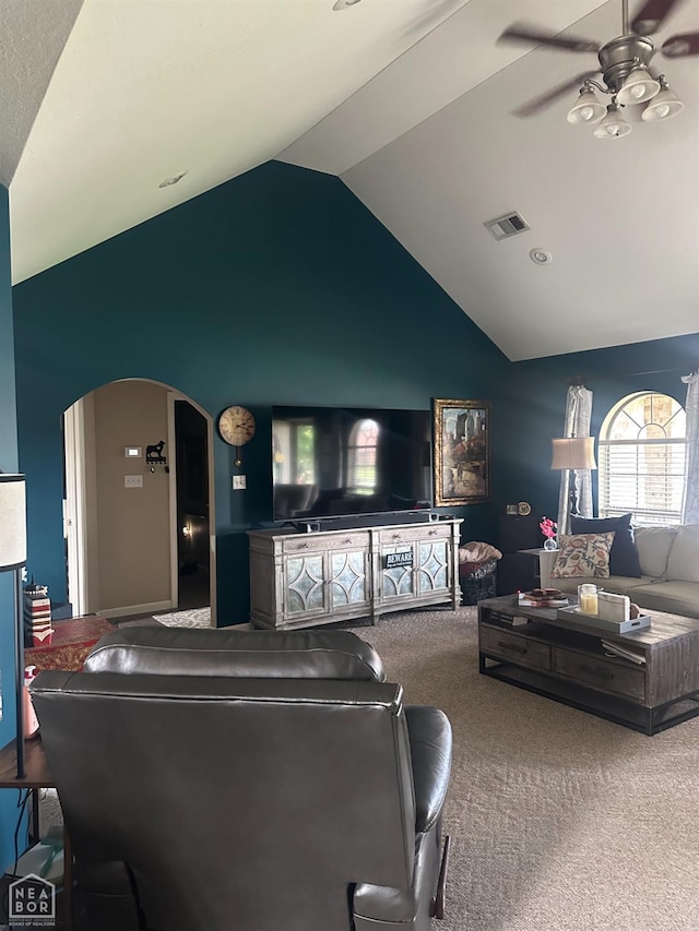 3006 Canterbury, Paragould, AR 72450 - living room with ceiling fan, carpet floors, arched walkways, and high vaulted ceiling