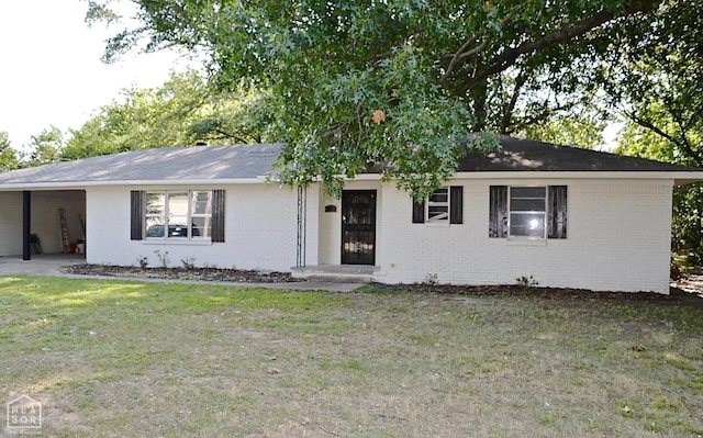 203 Scott St, Jonesboro, AR 72401 - ranch-style home with brick siding and a front lawn