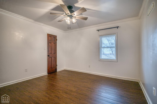 1721 W Main Extended, Trumann, AR 72472 - spare room with a ceiling fan, dark wood-style flooring, baseboards, and ornamental molding