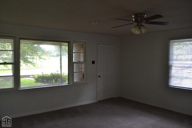 1808 Roy St, Jonesboro, AR 72401 - empty room with dark carpet and ceiling fan