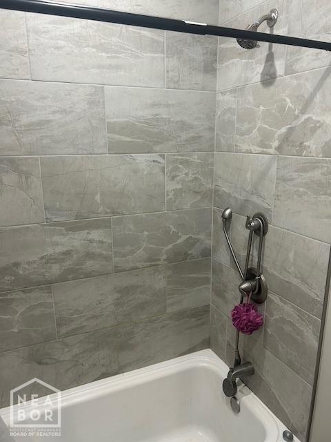 302 Hollis St, Bono, AR 72416 - bathroom featuring shower / washtub combination