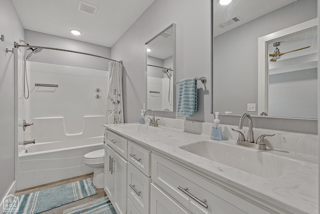 716 Gabe Ln, Manila, AR 72442 - full bathroom with shower / bath combination with curtain, toilet, and double vanity