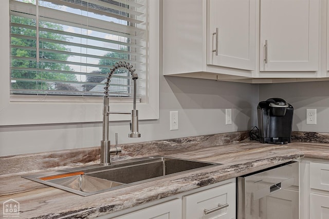 716 Gabe Ln, Manila, AR 72442 - kitchen with a sink, white cabinetry, and dishwasher