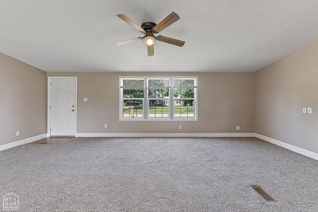 338 Buttercup Ln, Manila, AR 72442 - spare room featuring carpet and ceiling fan