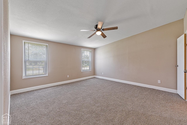 338 Buttercup Ln, Manila, AR 72442 - carpeted spare room with a ceiling fan and baseboards