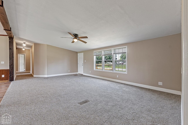 338 Buttercup Ln, Manila, AR 72442 - empty room featuring a ceiling fan, carpet flooring, and a textured ceiling