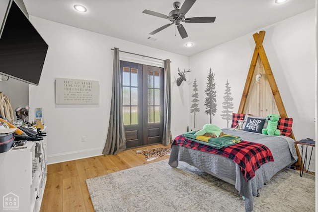 126 County Road 7459, Jonesboro, AR 72401 - bedroom with light wood-type flooring, recessed lighting, ceiling fan, and access to outside
