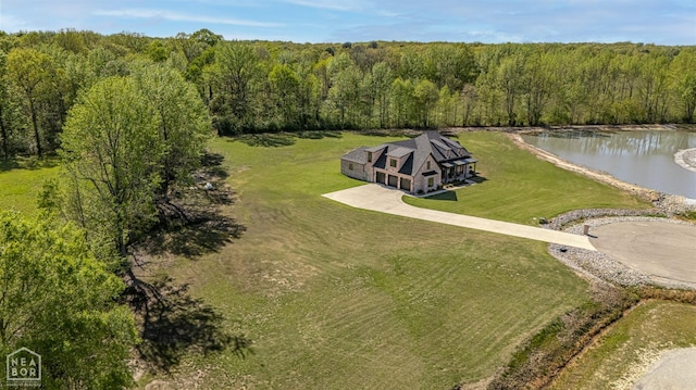 126 County Road 7459, Jonesboro, AR 72401 - view from above of property with a nearby body of water and a heavily wooded area