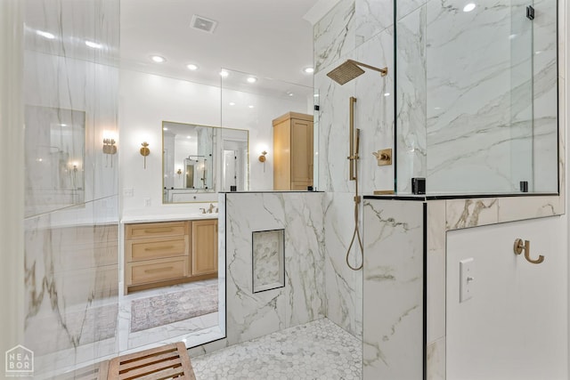 126 County Road 7459, Jonesboro, AR 72401 - bathroom with a marble finish shower, vanity, and recessed lighting