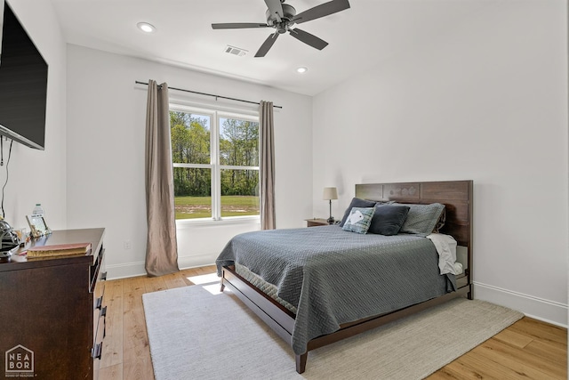126 County Road 7459, Jonesboro, AR 72401 - bedroom with light wood finished floors, recessed lighting, and ceiling fan