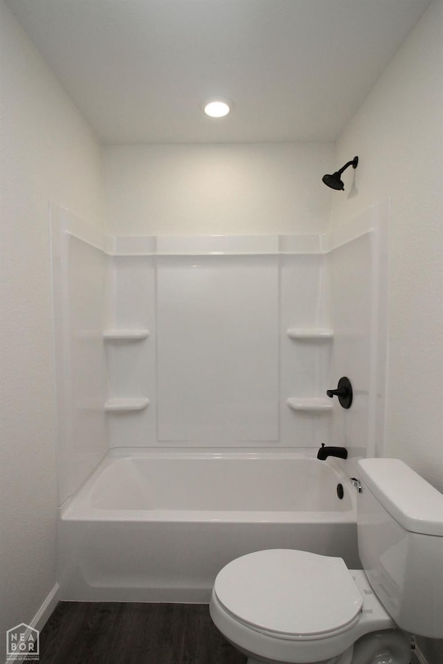 400 N 5th St, Paragould, AR 72450 - full bath with toilet, wood finished floors, shower / tub combination, baseboards, and recessed lighting