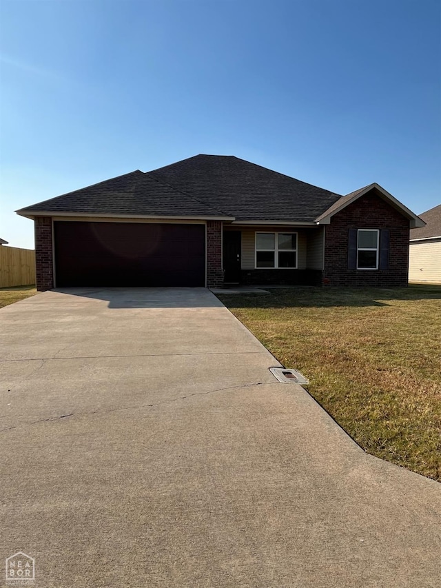 3721 Churchill Dr, Jonesboro, AR 72404 - ranch-style home with driveway, a garage, a shingled roof, and brick siding