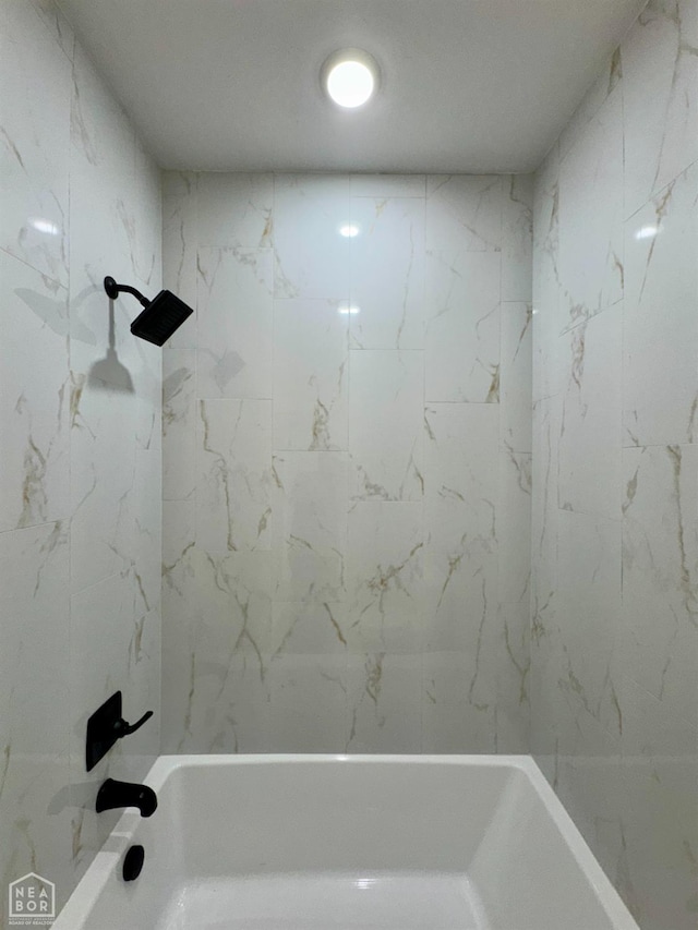 bathroom with washtub / shower combination