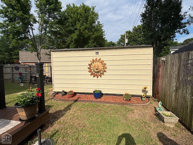 2208 Shafer Cir, Newport, AR 72112 - fenced backyard with an outbuilding