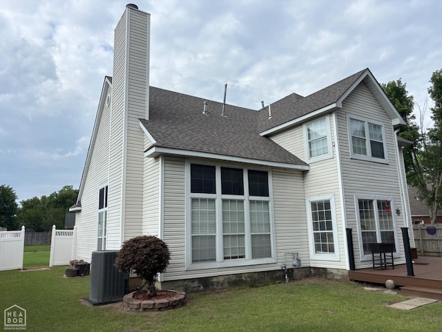 2208 Shafer Cir, Newport, AR 72112 - back of property featuring a deck, a chimney, and roof with shingles