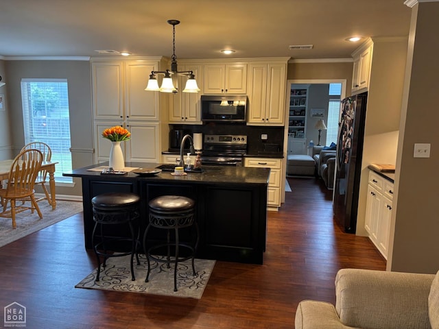 2208 Shafer Cir, Newport, AR 72112 - kitchen with electric stove, freestanding refrigerator, dark countertops, dark wood finished floors, and healthy amount of natural light