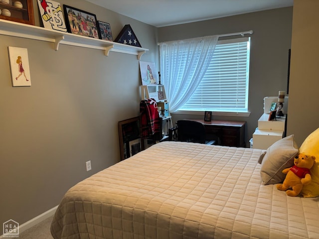 2208 Shafer Cir, Newport, AR 72112 - carpeted bedroom featuring baseboards