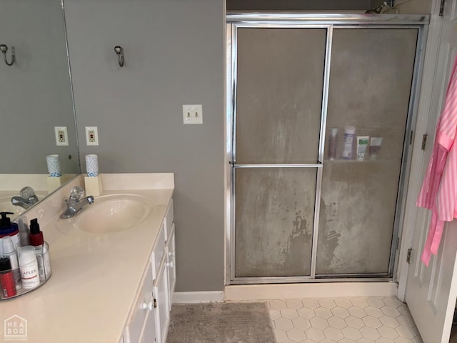 2208 Shafer Cir, Newport, AR 72112 - bathroom featuring vanity and a shower with door