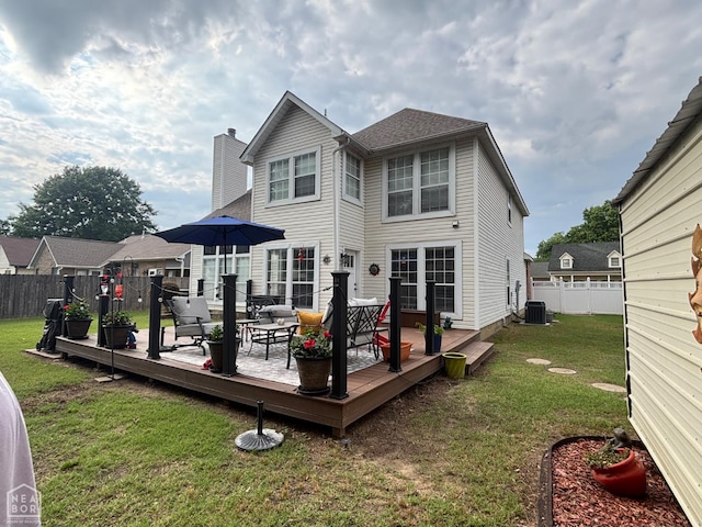 2208 Shafer Cir, Newport, AR 72112 - rear view of property with a wooden deck, a chimney, and an outdoor living space
