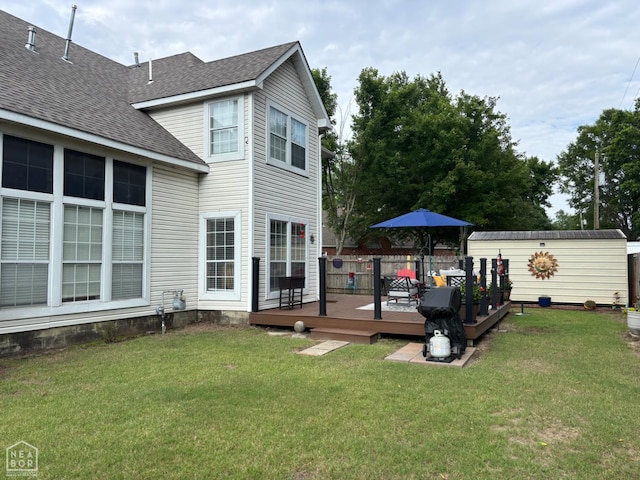 2208 Shafer Cir, Newport, AR 72112 - view of green lawn with a wooden deck