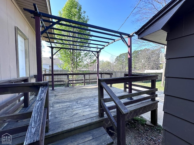 420 N 12th Ave, Piggott, AR 72454 - wooden deck with a fenced backyard