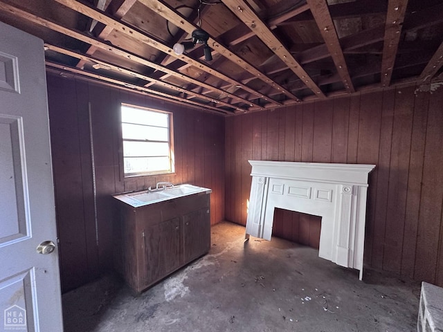 420 N 12th Ave, Piggott, AR 72454 - misc room with concrete floors and wood walls