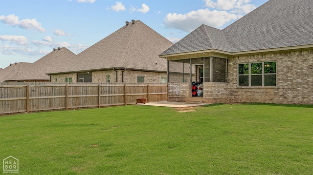 2720 Paradise Hills Ln, Jonesboro, AR 72405 - fenced backyard with a sunroom and a patio area