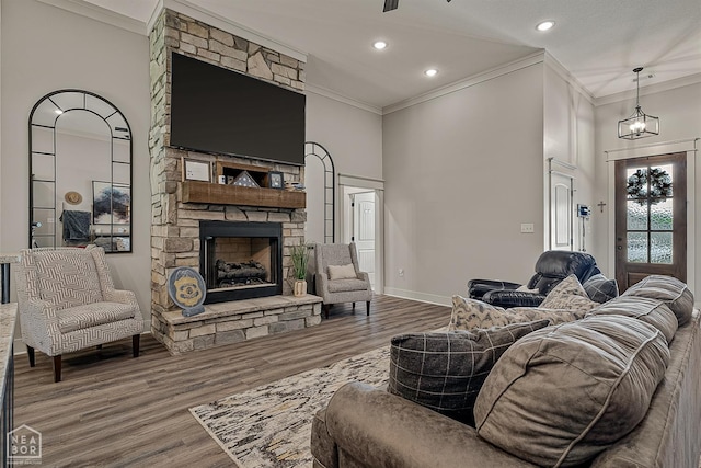 2720 Paradise Hills Ln, Jonesboro, AR 72405 - living room with ornamental molding, a fireplace, wood finished floors, and recessed lighting