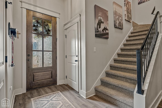 2720 Paradise Hills Ln, Jonesboro, AR 72405 - entryway featuring stairs and light wood-style flooring