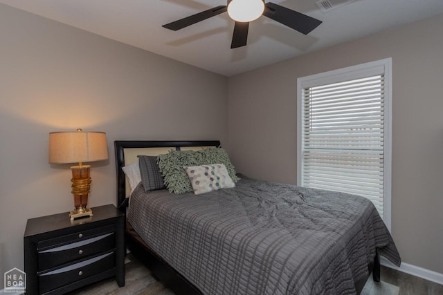 1011 S 59th St S, Paragould, AR 72450 - bedroom featuring wood finished floors and ceiling fan