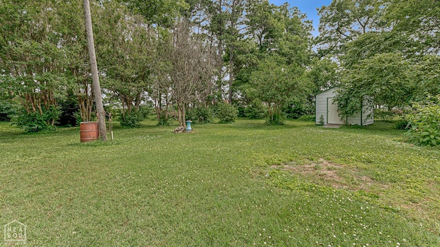 308 E Drew Ave, Monette, AR 72447 - view of grassy yard featuring view of wooded area