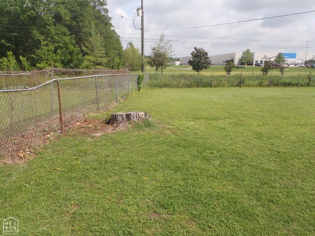 2009 Daugherty St, Newport, AR 72112 - view of yard featuring fence