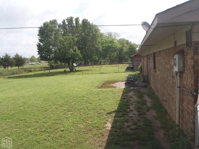 2009 Daugherty St, Newport, AR 72112 - view of yard featuring fence